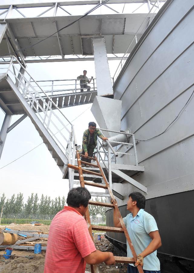 #(社会)(3)河北唐山大型纯秸秆沼气发酵池主体完工