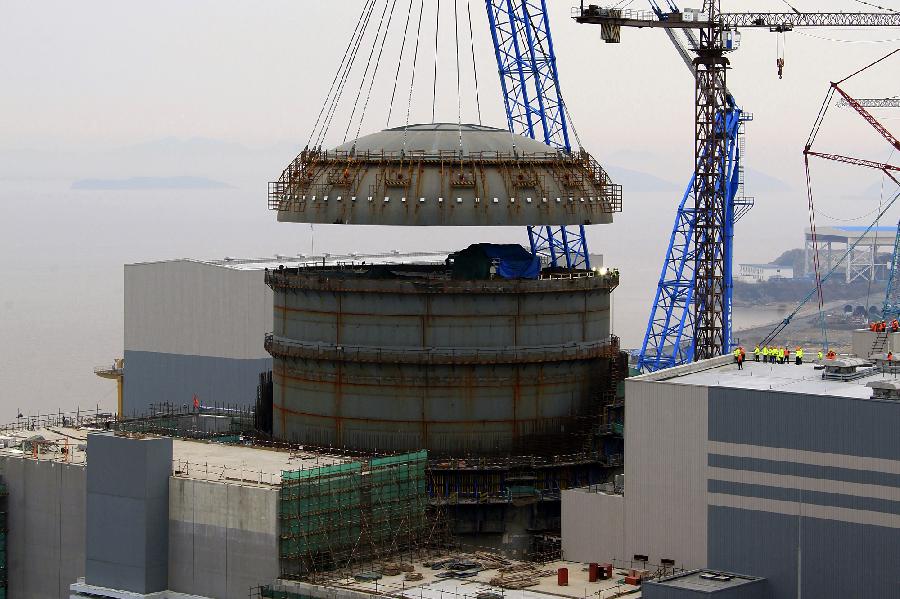 #（经济）（1）全国首台AP1000三代核电机组安全壳封顶